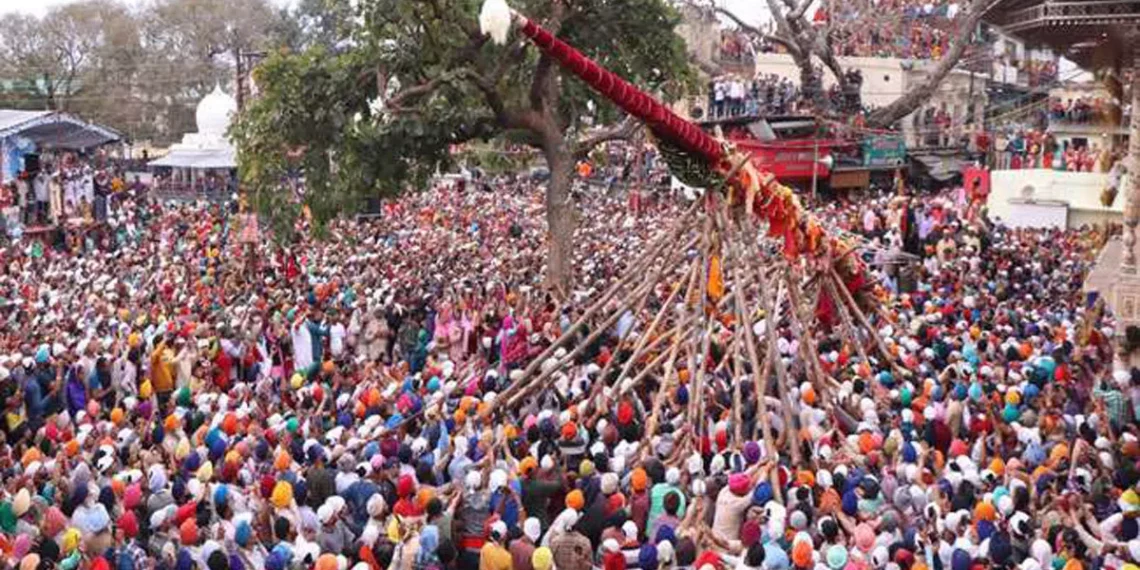Historic Jhanda Mela Begins with Hoisting of Jhande Ji at Darbar Sahib